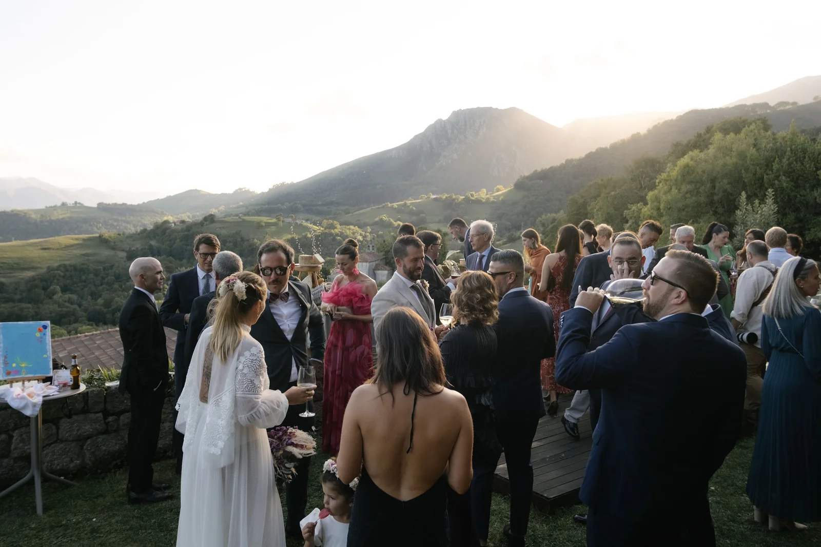 Cocktail at sunset with mountain views — Pueblo Astur