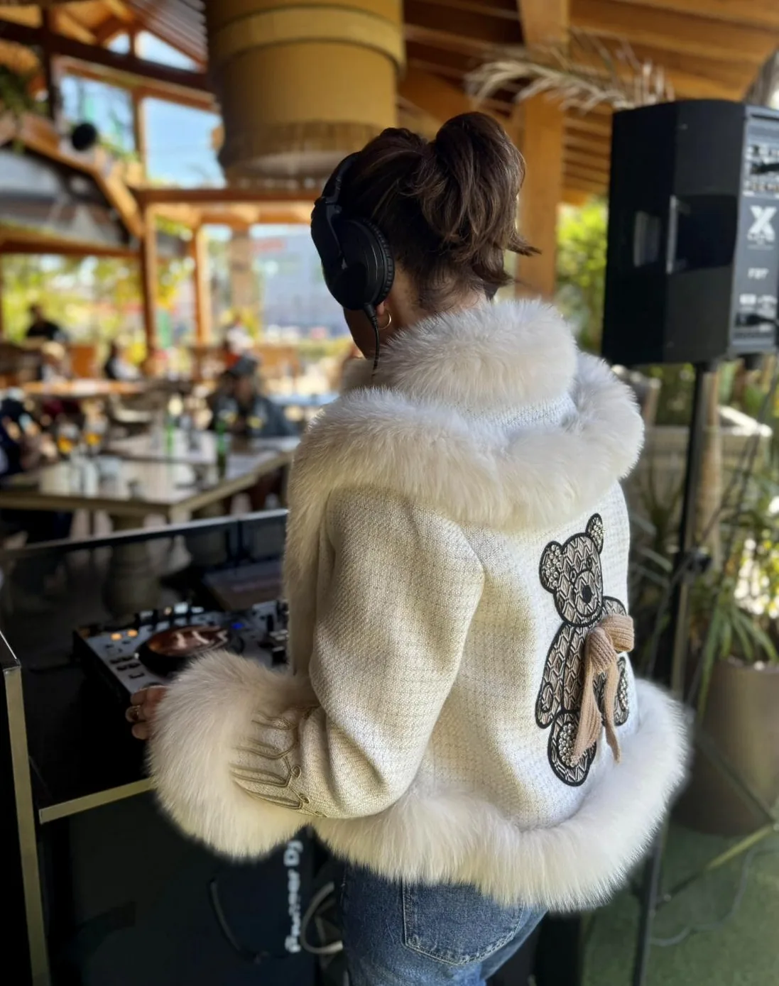 María Martín on a daytime terrace — sunset session
