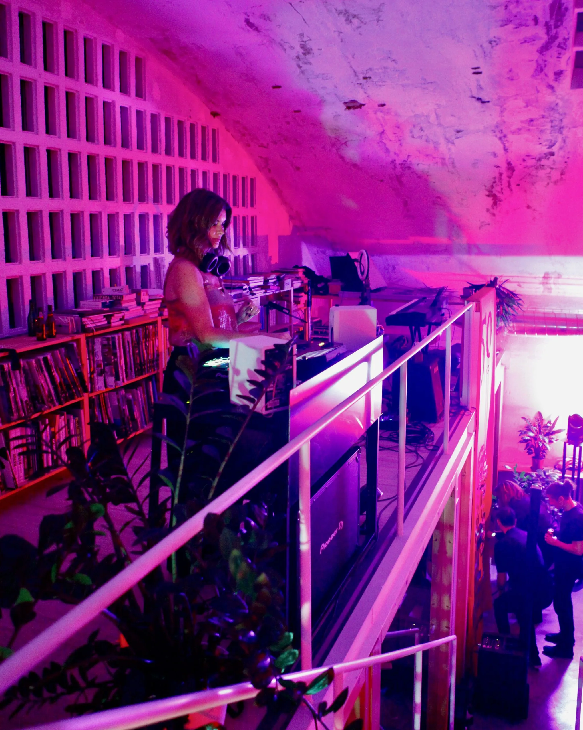 Vaulted room with fuchsia lighting