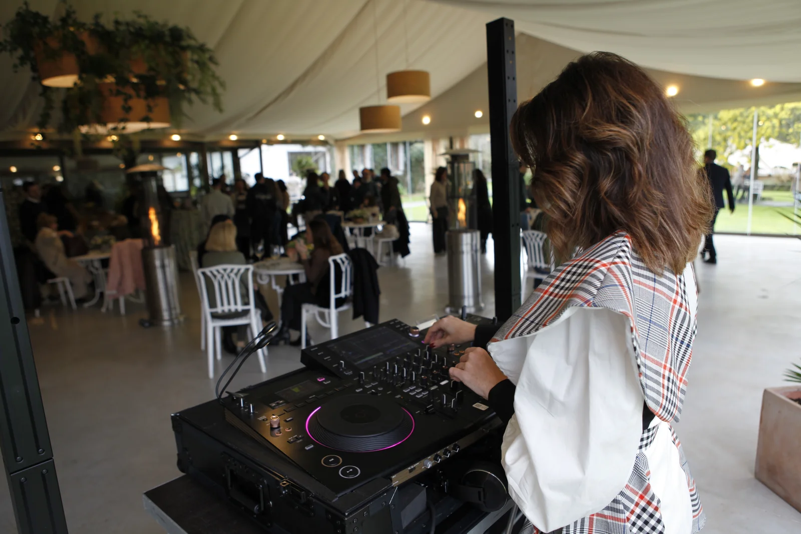 DJ at a corporate marquee cocktail