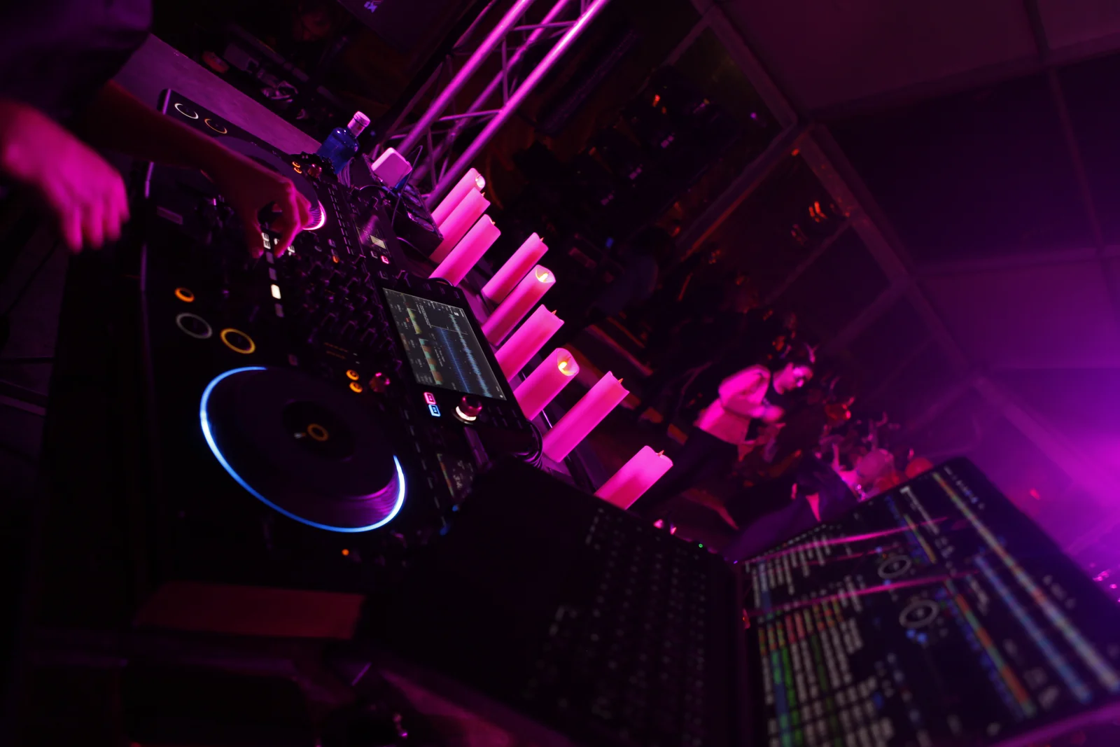 DJ booth with candles at a corporate event