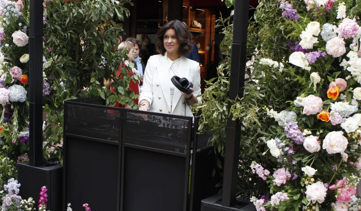 María Martín DJing at a sunset session — outdoor vibe