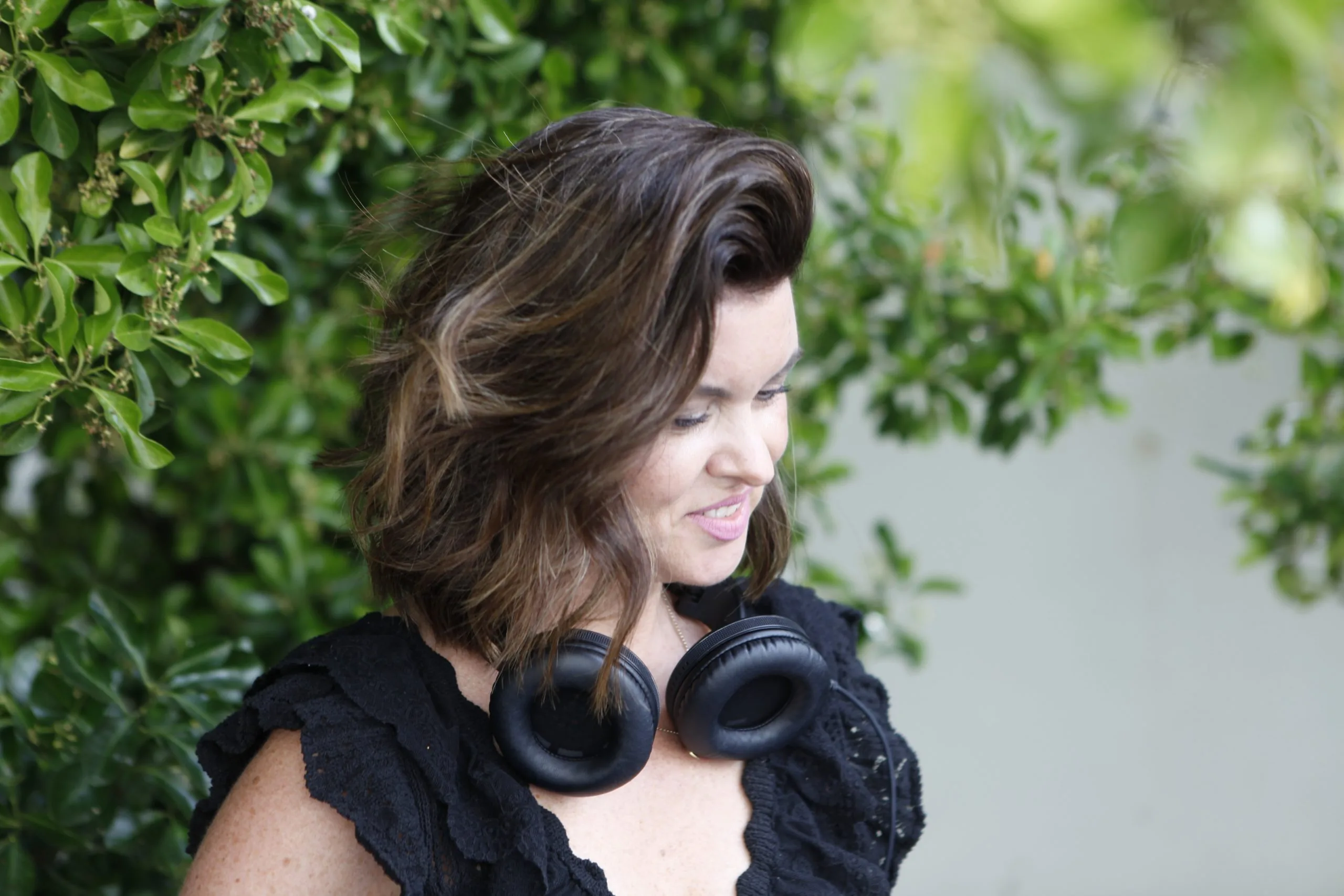 DJ María Martín at a sunset session — open-air booth